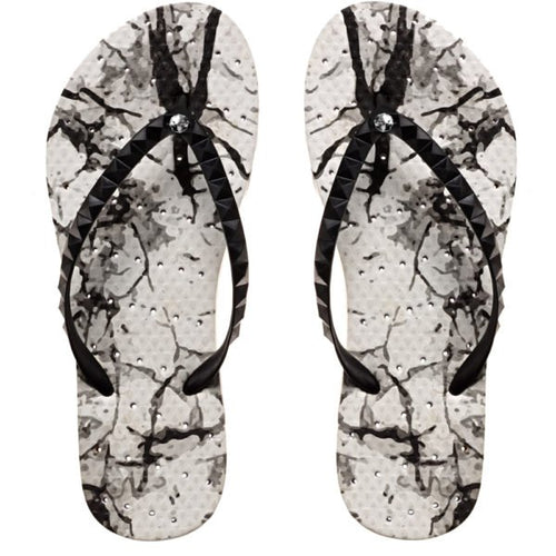 image of shower flip flops with an abstract print. Showaflops